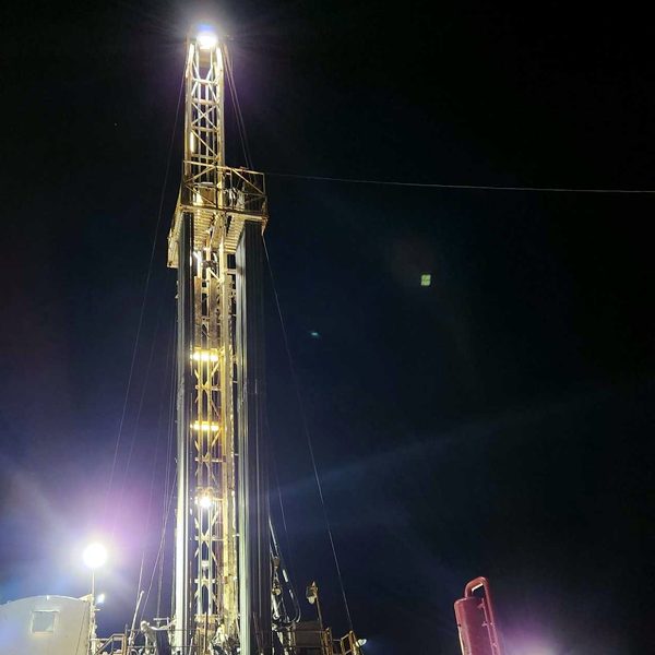 A drilling rig at night